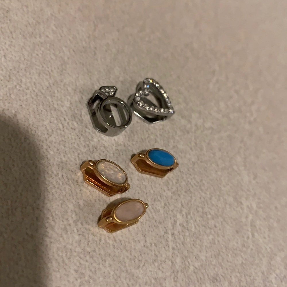 Set of 5 keep collective charms.